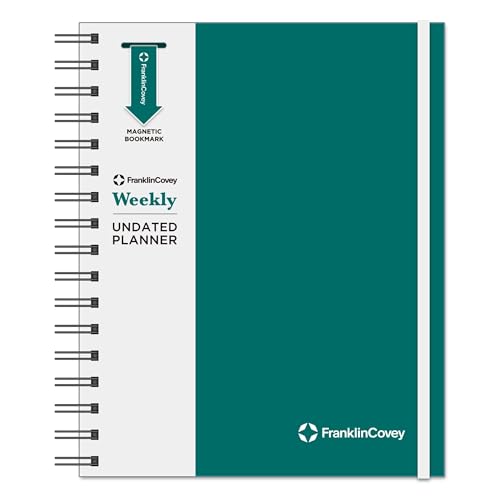Wire-bound weekly planner with blank date pages and a sturdy cover, approximately A5 size.