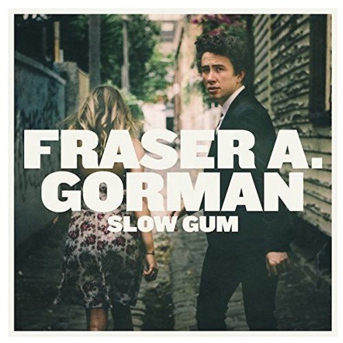 Album cover featuring a man and woman walking down a cobblestone alleyway together.
