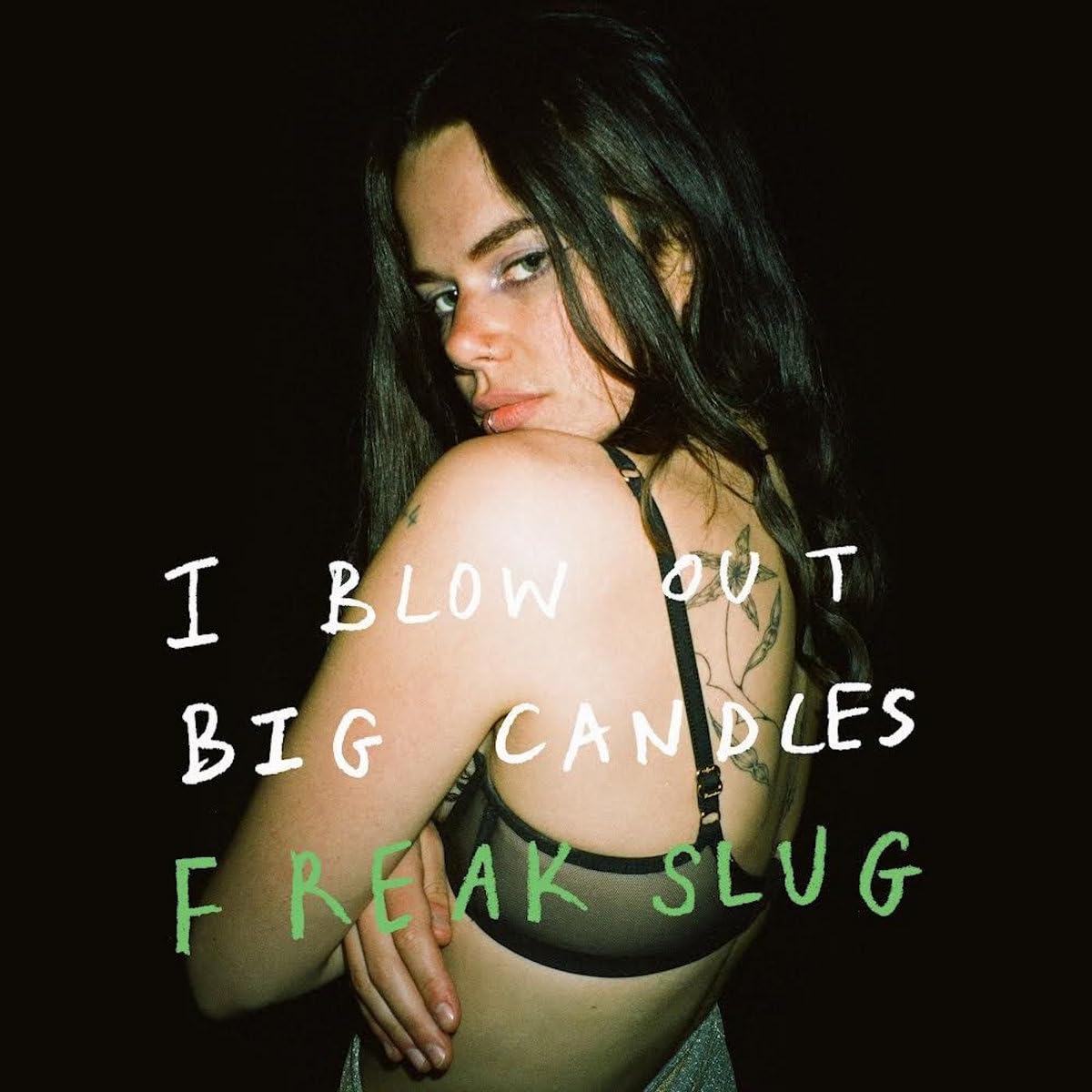 Portrait of a woman with text overlay: "I Blow Out Big Candles.