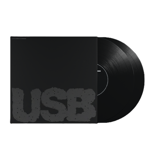 Black vinyl record with black sleeve displaying large white "USB" text.