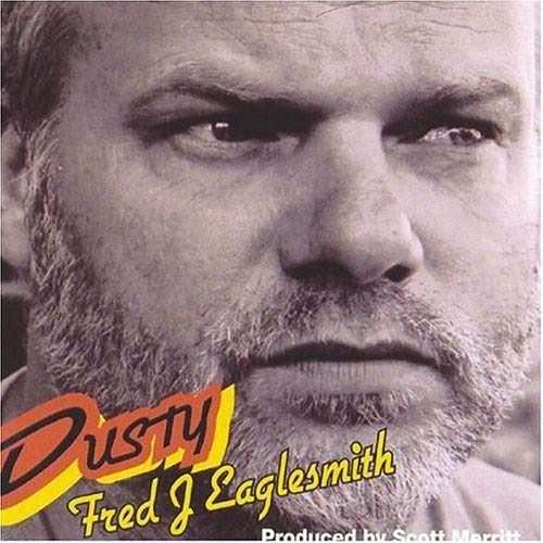 Album cover with black and white photo of man with beard and mustache.