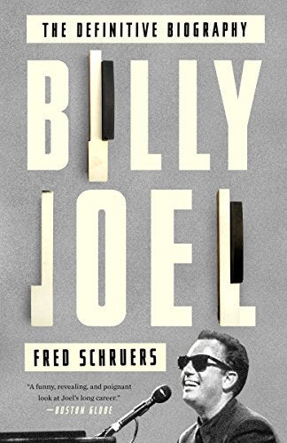 Book cover for “Billy Joel: The Definitive Biography” with a portrait.