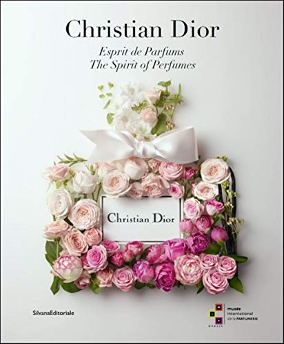 Book cover for "Christian Dior: The Spirit of Perfumes" with floral arrangement.