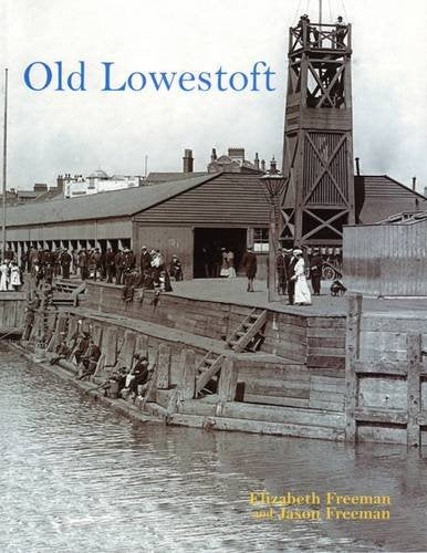 Vintage photograph of a busy Lowestoft dockside with a tall crane.