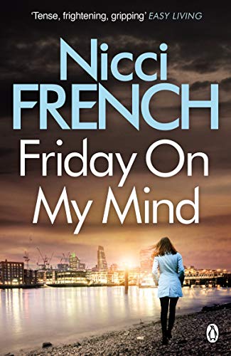 Book cover: woman with back to viewer, city skyline, moody lighting.
