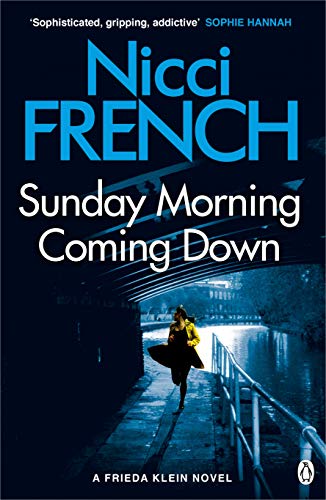 Book cover: woman walking under a bridge, dark blue and white text.
