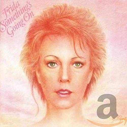 Frida album cover: close-up portrait of a woman with red hair.