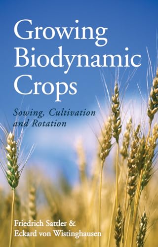Book cover: "Growing Biodynamic Crops" with wheat stalks in a field.