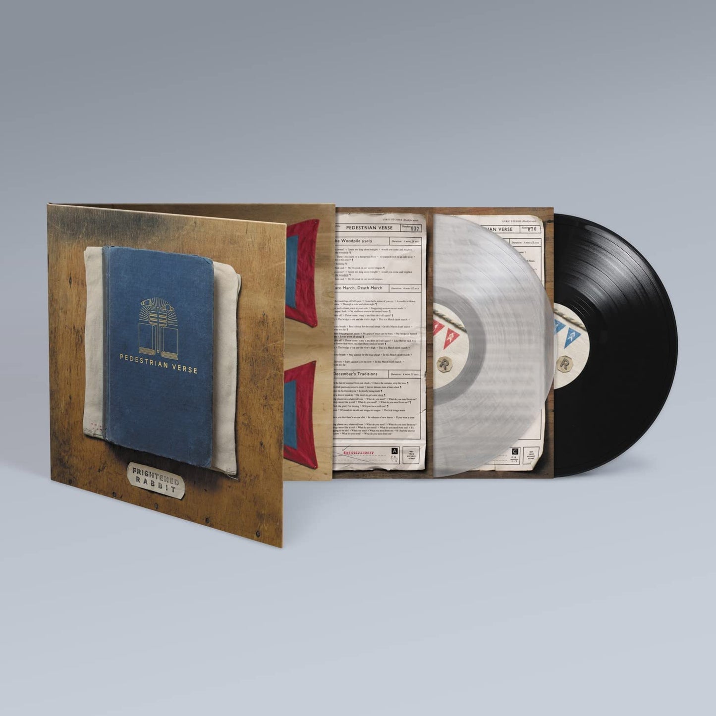 "Vinyl record and sleeve with blue cover, titled 'Pedestrian Verse' by Frightened Rabbit."