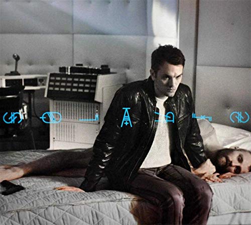 CD cover: man in leather jacket, reclining figures, electronic equipment.