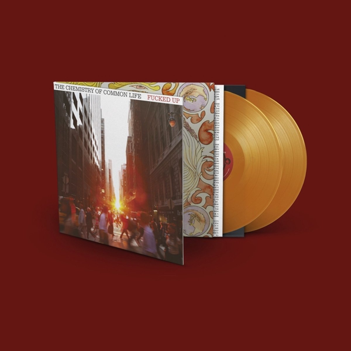 Fucked Up vinyl record with city street album art and yellow disc.