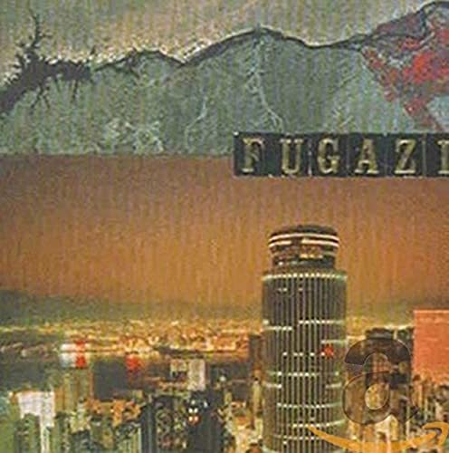 Fugazi album cover: cityscape with mountains, brown tones, and band name.