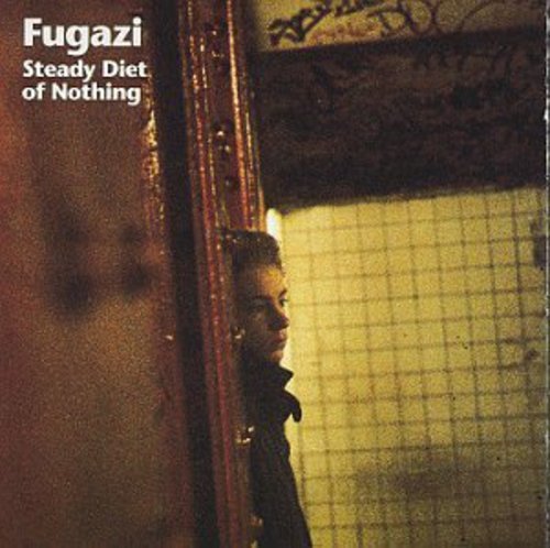 Fugazi album cover: a man in a doorway, muted yellow tones.