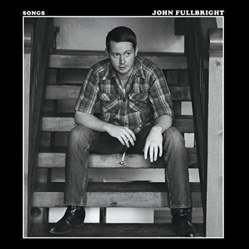 Black and white album cover featuring a man sitting on wooden stairs, holding keys.