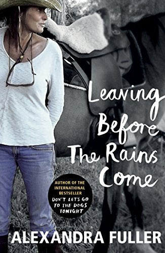 Book cover: woman with sheep, dark horse blurred in background.