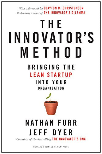 White book cover with bold red and black text, a small potted plant, and author names.