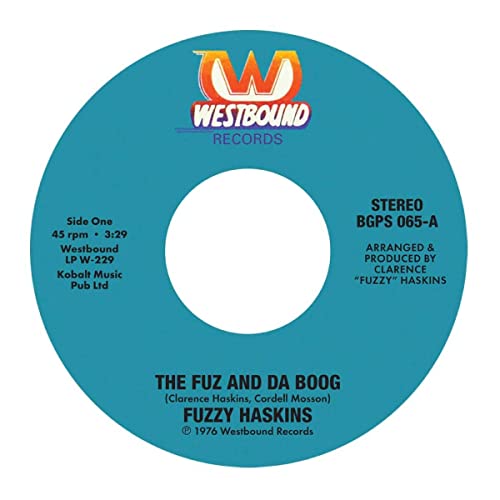 Blue and white 7-inch vinyl record label with "Fuzzy Haskins" text.
