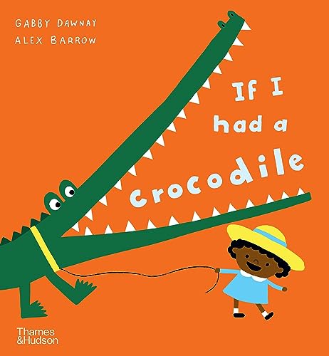 A child in a yellow hat leads a large green crocodile on a leash.