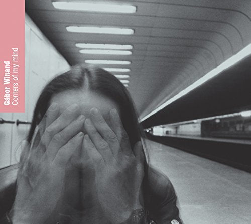 CD cover: black and white photo of a person covering their face.