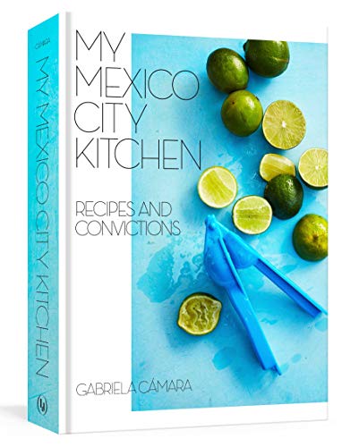 Book cover for My Mexico City Kitchen with limes and a blue citrus press.