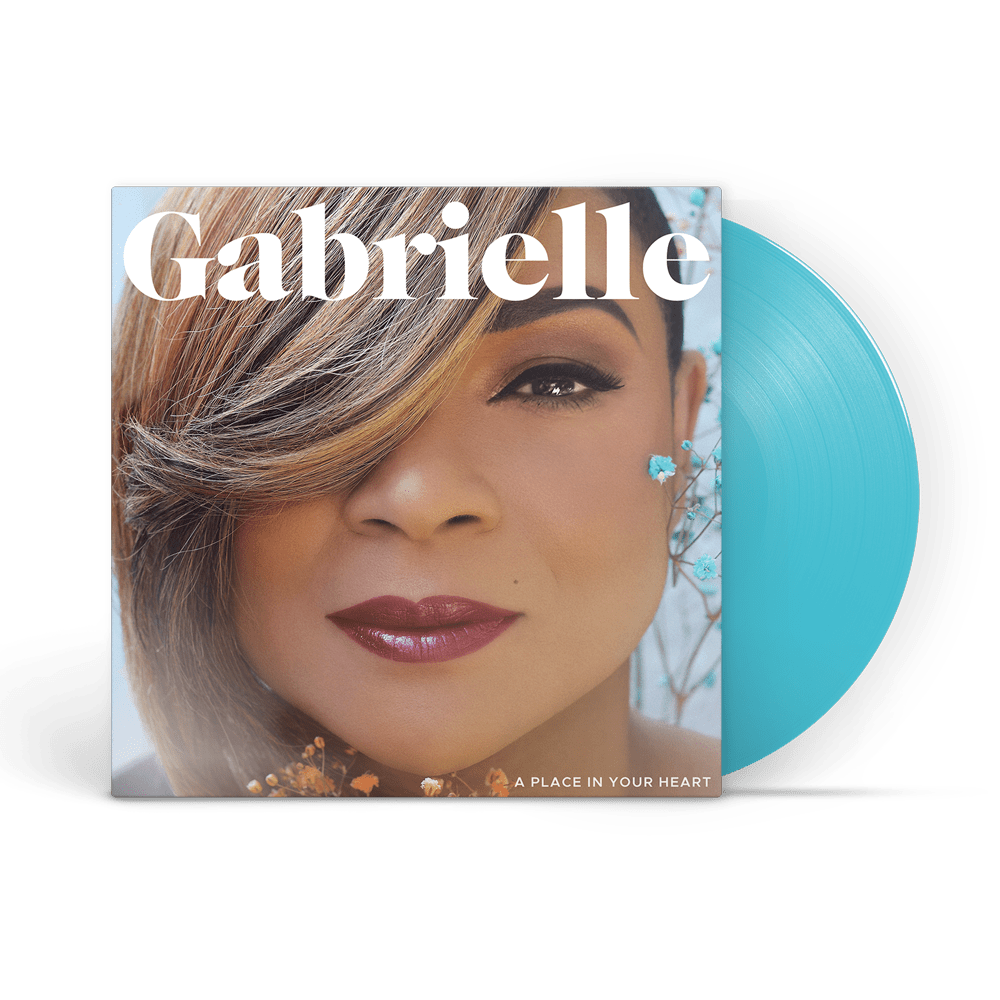 Gabrielle album cover featuring a close-up portrait with a bright blue vinyl record behind.