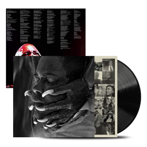 Vinyl record with album cover featuring a portrait and tracklist.