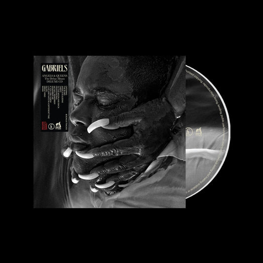 "CD album cover with a black-and-white image of a man's face."