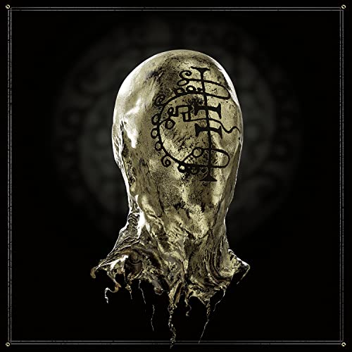 Dark album cover featuring a textured, metallic, mask-like head.