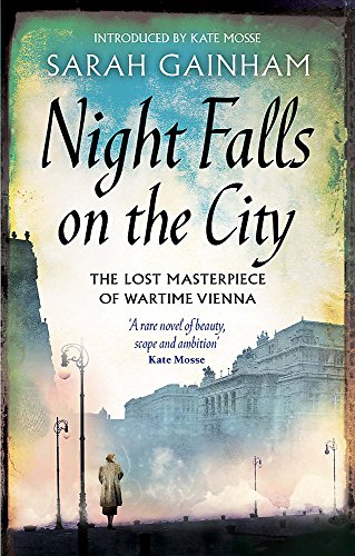 Book cover: woman views illuminated Vienna buildings at dusk.
