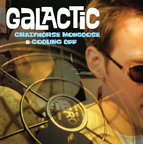"Album cover with a man in sunglasses and a fan in the foreground."