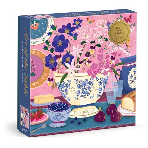 A 500-piece puzzle box featuring a floral still life illustration on a table.