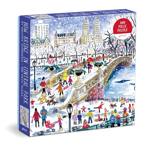 Bow Bridge in snowy Central Park with people skating and walking.