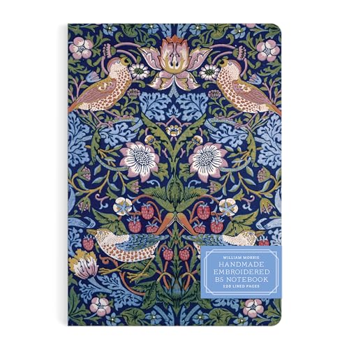 Blue journal cover with embroidered birds, strawberries, and floral design.