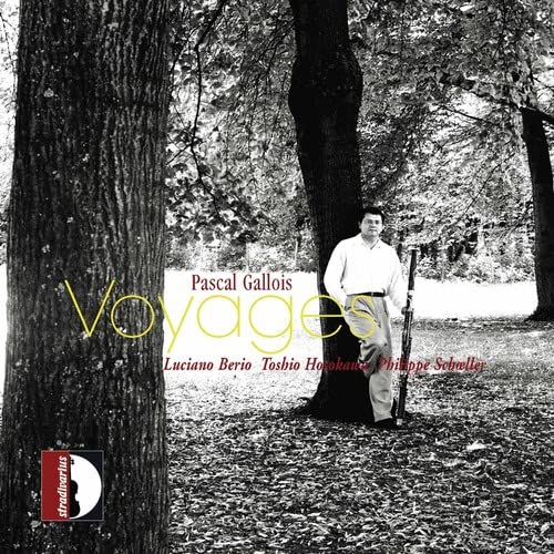 CD cover: Man with cello in a forest, text "Voyages" and artist name.