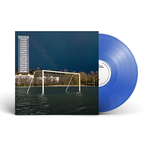 Blue vinyl record with album cover showing a goalpost and building.