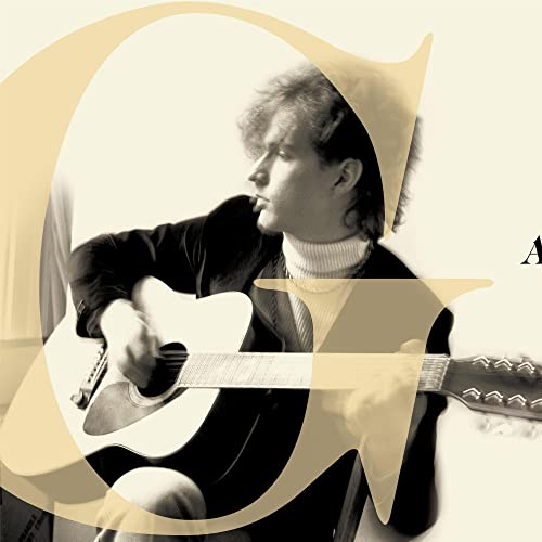 Man with guitar framed by a large, stylized letter "G".