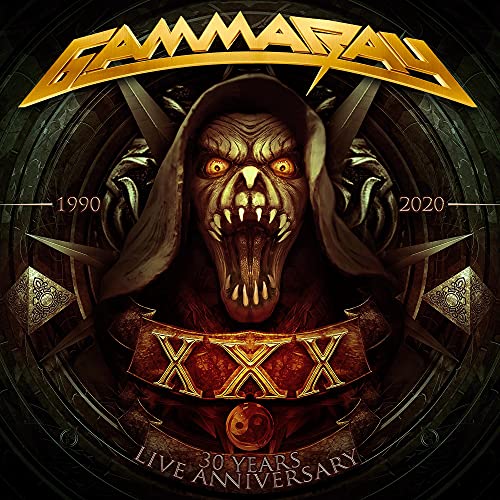 Gamma Ray album cover featuring a monstrous face and band logo.