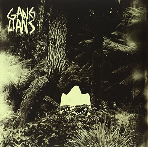 Dark, textured album cover with ferns and a stone monument shape.