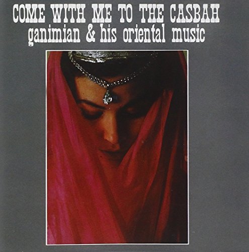 "Album cover with a woman wearing a red veil and ornate headpiece."