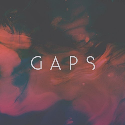 The image shows the word "GAPS" in white text against a dark, abstract background.