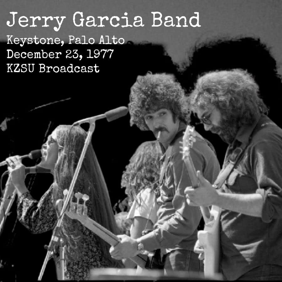 Black and white photo of Jerry Garcia Band performing live onstage.