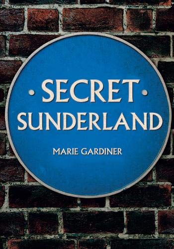 Blue plaque reading "Secret Sunderland" by Marie Gardiner against brick wall.