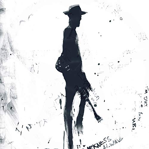The image depicts a black silhouette of a man holding a guitar. Alt text: Silhouette of man with guitar on white background with abstract markings.