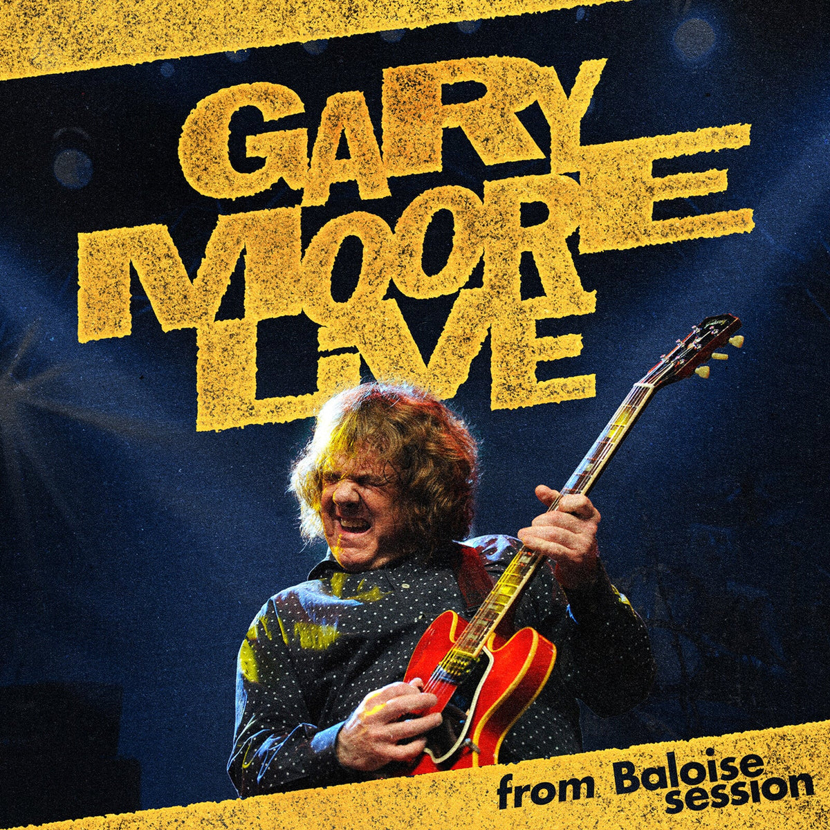 Gary Moore playing a red electric guitar on a dark stage with yellow text.