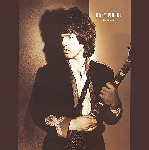 Gary Moore album cover: portrait of a man with a guitar.