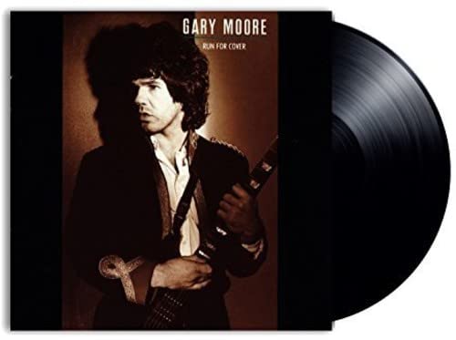Gary Moore album cover and vinyl record, sepia and black tones.
