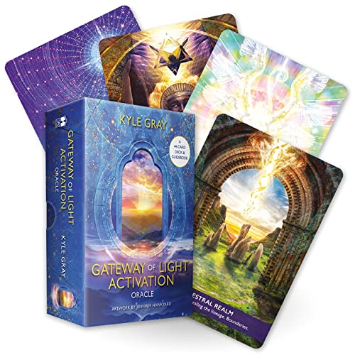 Oracle card deck and guidebook with celestial and landscape imagery.