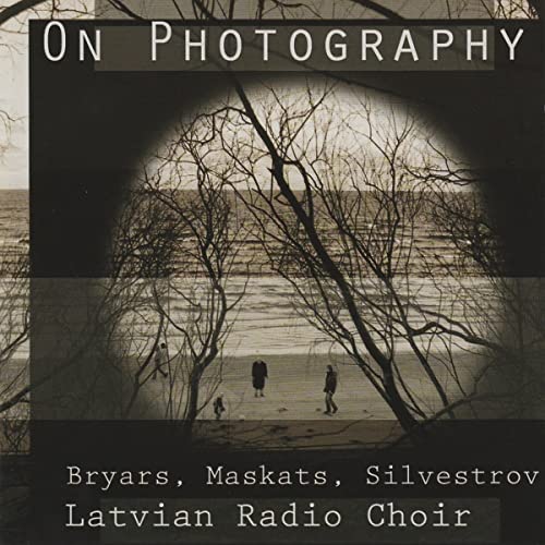 CD cover: black and white landscape with figures, text “On Photography”.