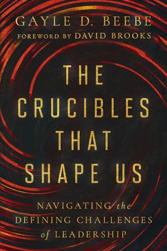 Book cover: "The Crucibles That Shape Us" with swirling red and black design.