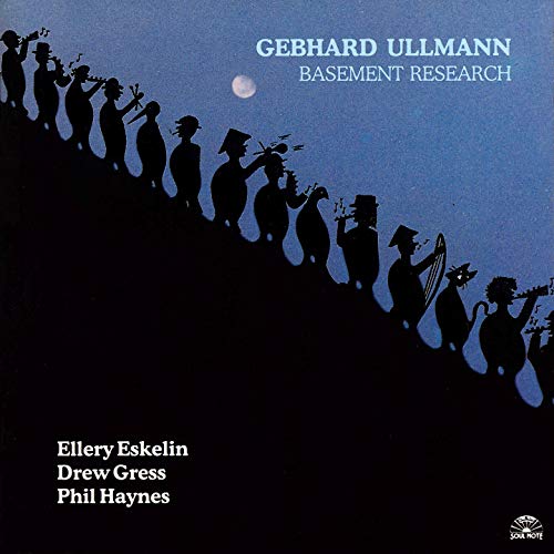 CD cover: Silhouette musicians against a blue sky with a full moon.
